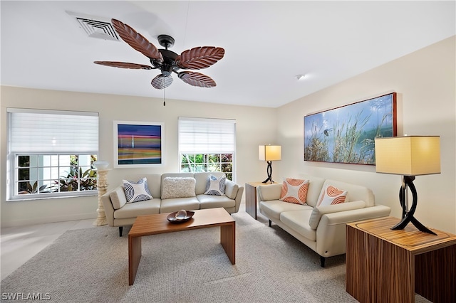 1303 Wahoo Ct, Naples, FL 34102 - carpeted living room featuring a ceiling fan