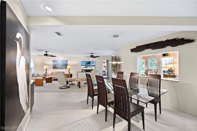 1303 Wahoo Ct, Naples, FL 34102 - dining space featuring ceiling fan and light tile patterned floors