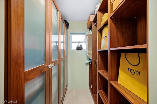 1303 Wahoo Ct, Naples, FL 34102 - spacious closet with light carpet