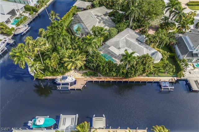 drone / aerial view with a water view