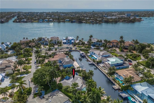 drone / aerial view with a water view