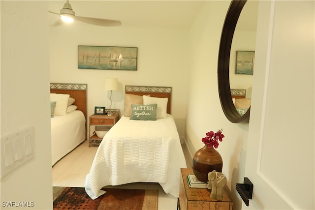 bedroom featuring ceiling fan and hardwood / wood-style floors