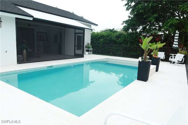 view of pool featuring a patio area