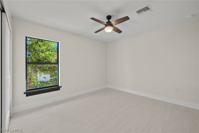 12230 Matlacha Blvd, Matlacha Isles, FL 33991 - unfurnished room with a ceiling fan and baseboards