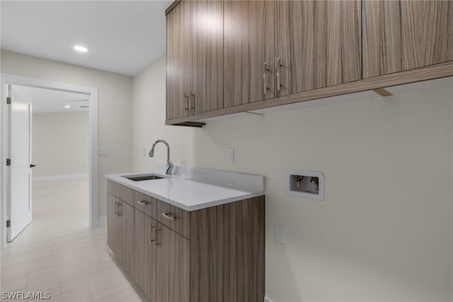 12230 Matlacha Blvd, Matlacha Isles, FL 33991 - washroom featuring hookup for a washing machine, cabinet space, baseboards, and recessed lighting