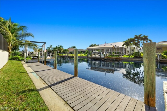 12230 Matlacha Blvd, Matlacha Isles, FL 33991 - dock area with a water view and a residential view