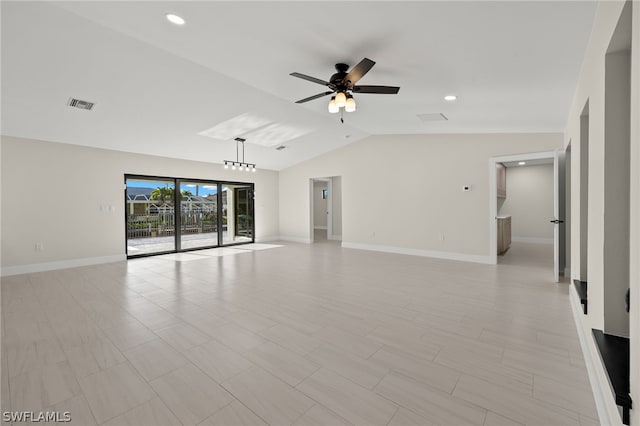 interior space with ceiling fan and vaulted ceiling