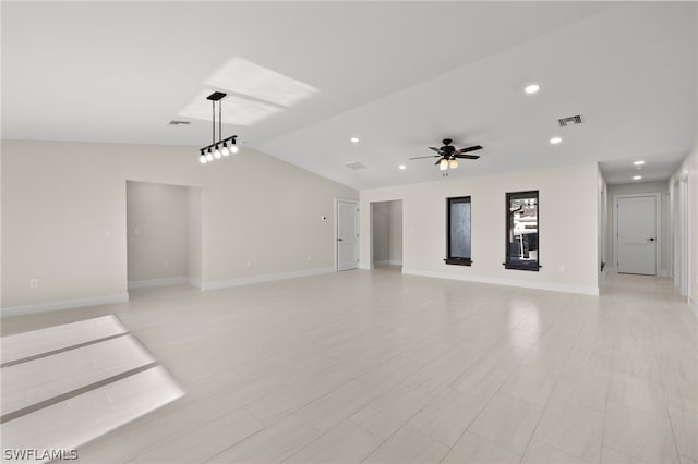 12230 Matlacha Blvd, Matlacha Isles, FL 33991 - unfurnished living room featuring vaulted ceiling, a ceiling fan, baseboards, and recessed lighting