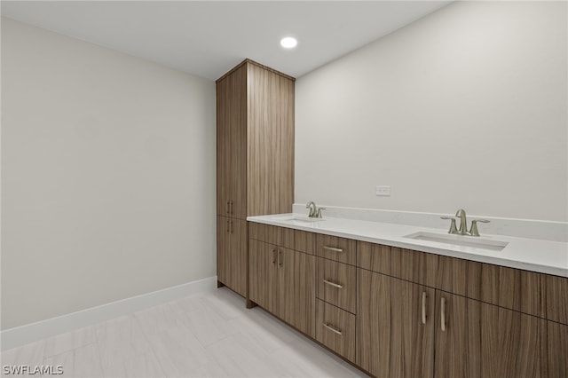 12230 Matlacha Blvd, Matlacha Isles, FL 33991 - full bathroom featuring double vanity, baseboards, and recessed lighting