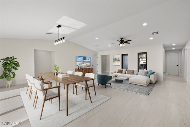 dining room featuring ceiling fan and vaulted ceiling