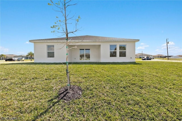 view of front of home with a front yard