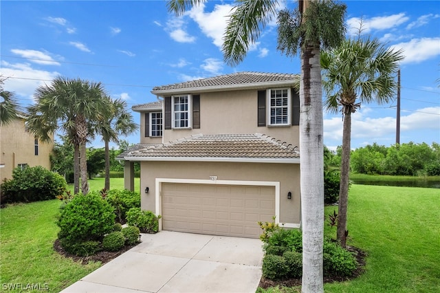 view of front of house featuring a garage and a front yard