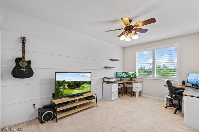 carpeted office with ceiling fan