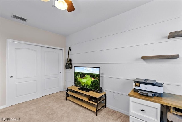 interior space featuring light colored carpet