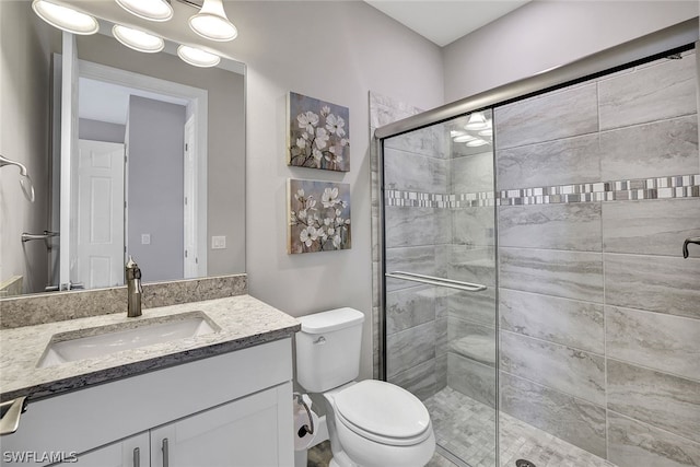 20012 Tavernier Dr, Estero, FL 33928 - full bath with a stall shower, toilet, and vanity