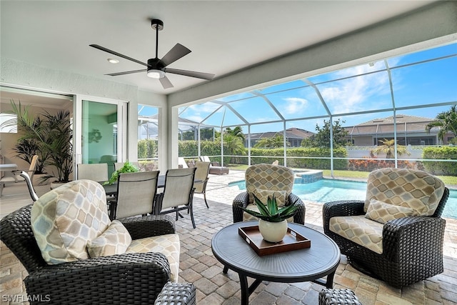 20012 Tavernier Dr, Estero, FL 33928 - view of patio featuring ceiling fan, outdoor dining space, a lanai, and an outdoor pool