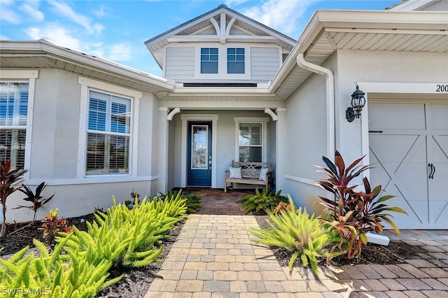 property entrance featuring a garage