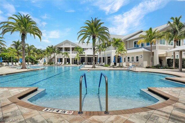 view of swimming pool featuring a patio