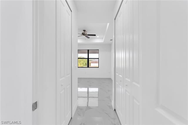 hall with light tile patterned flooring