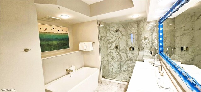 bathroom with vanity and plus walk in shower