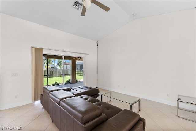 living room with light tile patterned flooring, vaulted ceiling, and ceiling fan