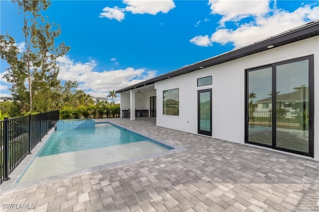 view of swimming pool featuring a patio