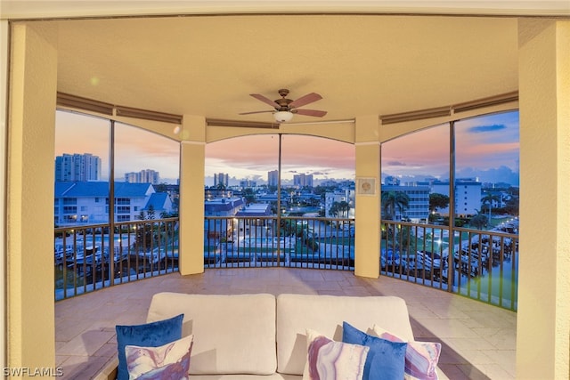 interior space featuring ceiling fan