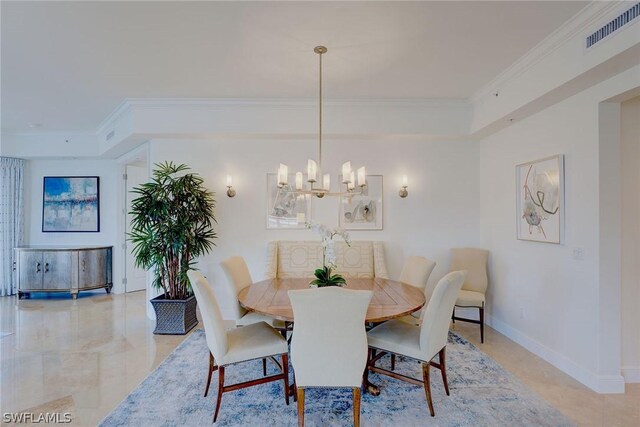 dining space with a raised ceiling, crown molding, light tile patterned floors, and an inviting chandelier