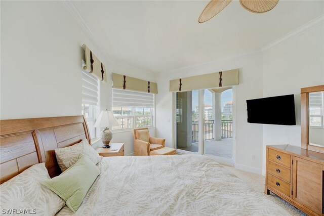 carpeted bedroom with access to exterior, crown molding, and ceiling fan