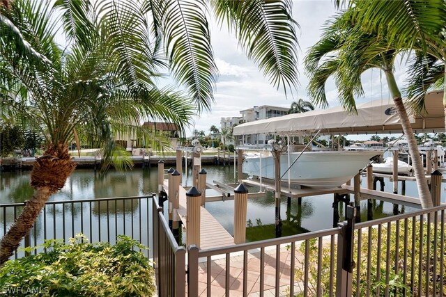 dock area featuring a water view