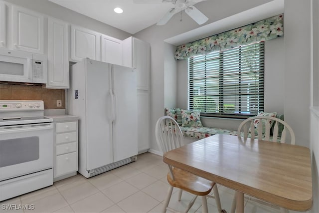 7685 Meadow Lakes Dr Unit 1301, Naples, FL 34104 - kitchen featuring white appliances, white cabinetry, ceiling fan, tasteful backsplash, and light tile patterned flooring