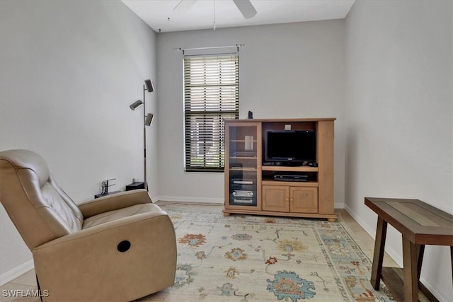 7685 Meadow Lakes Dr Unit 1301, Naples, FL 34104 - living area with healthy amount of natural light, a ceiling fan, and baseboards