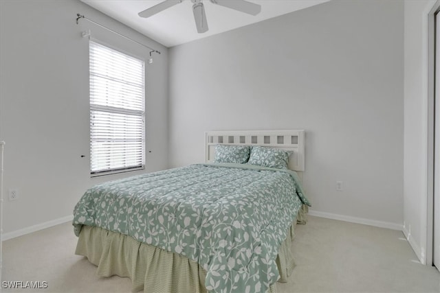 7685 Meadow Lakes Dr Unit 1301, Naples, FL 34104 - bedroom featuring carpet flooring, multiple windows, and baseboards