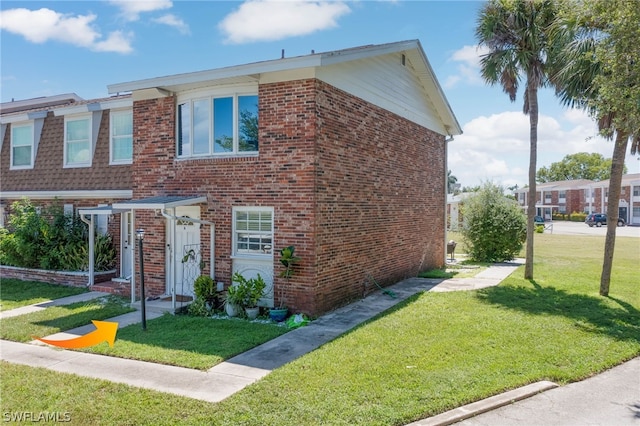 view of front of house with a front lawn