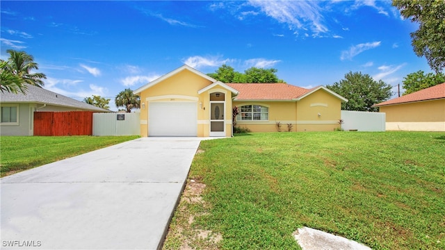 ranch-style house with a garage and a front yard