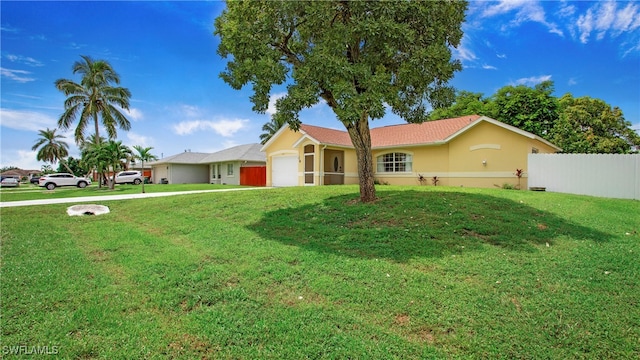 single story home with a front lawn