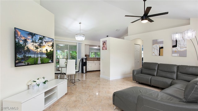 living room featuring lofted ceiling and ceiling fan