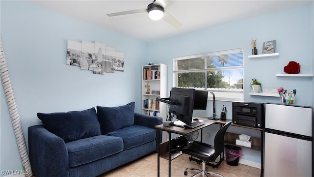 tiled office space with ceiling fan