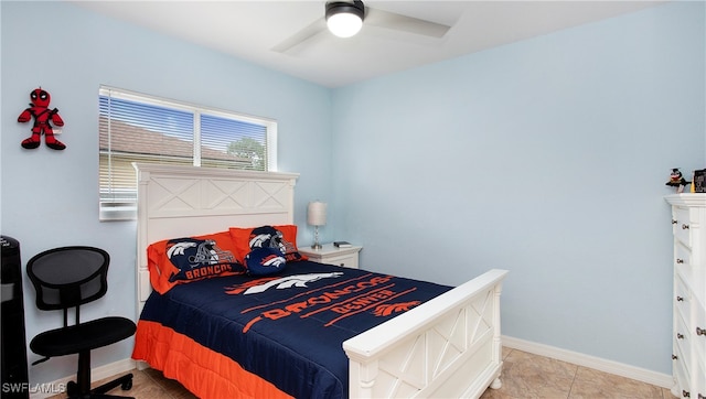 bedroom with light tile patterned flooring and ceiling fan