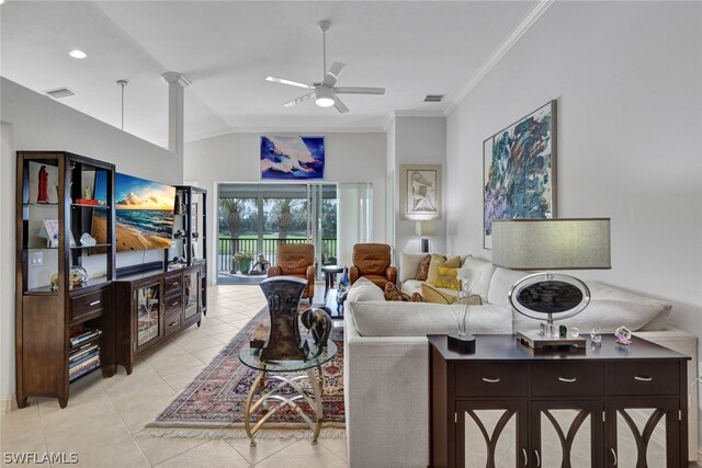 tiled living room featuring ceiling fan, ornamental molding, and lofted ceiling