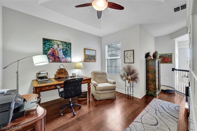 office space with ceiling fan and dark wood-type flooring