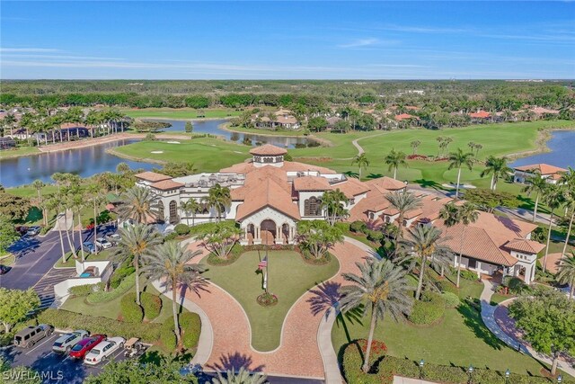 bird's eye view with a water view