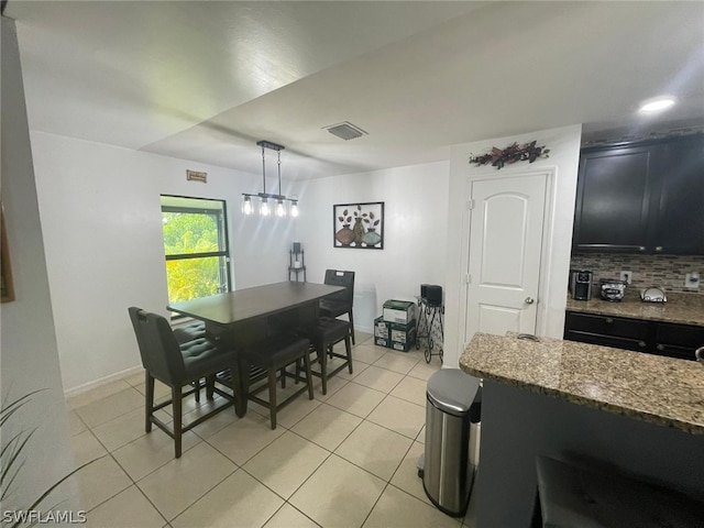 view of tiled dining space