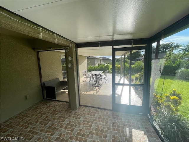 view of unfurnished sunroom