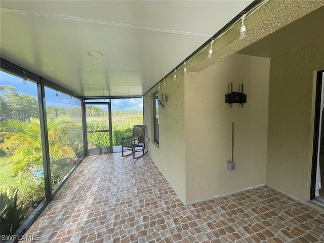 view of unfurnished sunroom