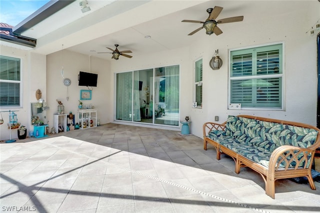 view of patio / terrace featuring ceiling fan