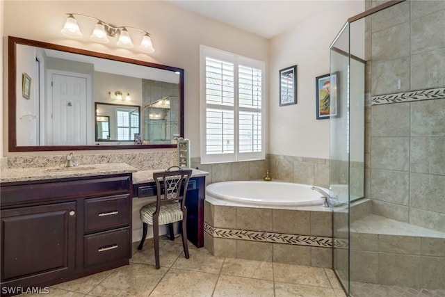 bathroom with vanity, tile patterned floors, and independent shower and bath