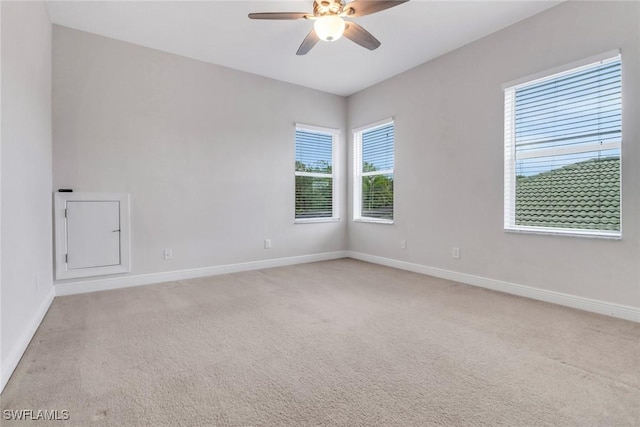 7787 Martino Cir, Naples, FL 34112 - empty room featuring ceiling fan and light colored carpet