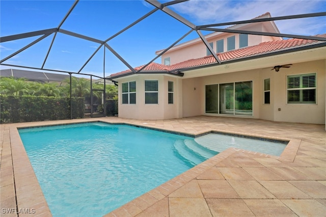 7787 Martino Cir, Naples, FL 34112 - swimming pool with a patio area, ceiling fan, and glass enclosure