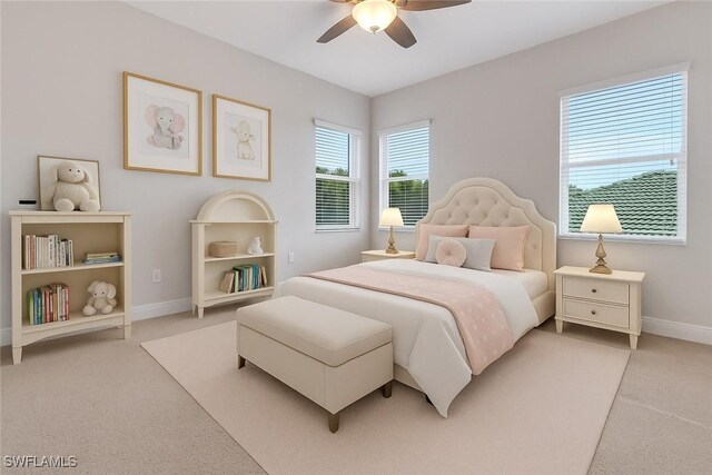 7787 Martino Cir, Naples, FL 34112 - bedroom featuring light carpet and a ceiling fan